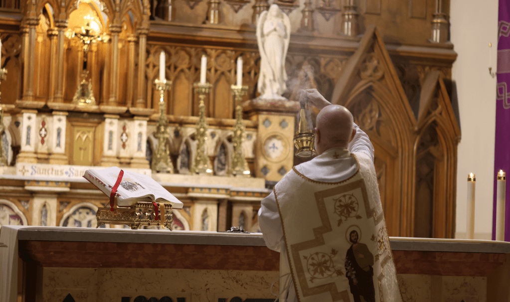 Fr McGowan saying Mass